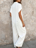 Solid-color Textured Crinkle Jumpsuit With Lapel Collar, Half-button Front, And Ankle-length Wide Legs